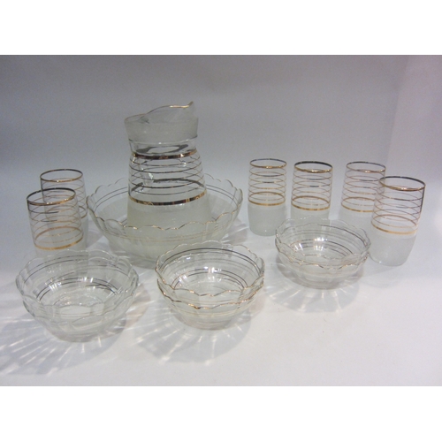 4376 - A circa 1950's lemonade set comprising of six tumbler jugs, dessert dishes amd dessert bowl  GROUP