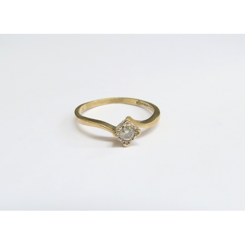 8015 - A 9ct gold diamond solitaire ring, illusion set stone in square setting, 0.10ct. Size Q, 1.6g   (E) ... 