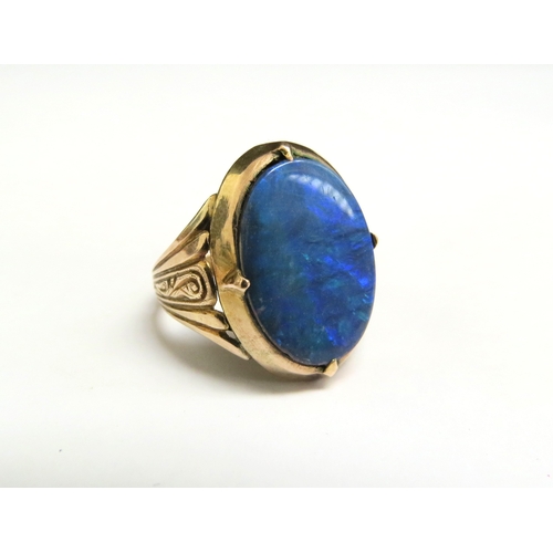 8066 - A gold oval opal doublet ring, stamped 14k. Size J/K, 4.7g