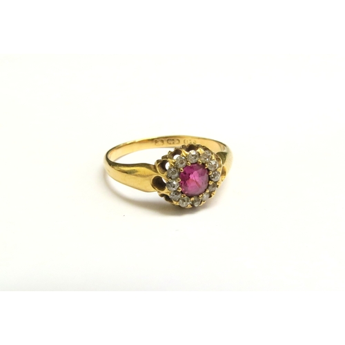 8076 - A late 19th Century 18ct gold ruby and diamond cluster ring. Size O, 2.8g   (C)