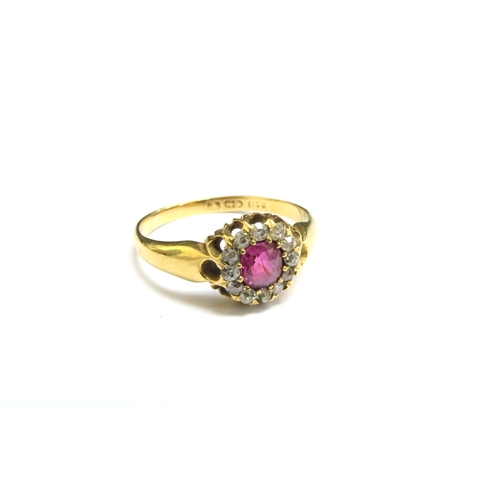 8076 - A late 19th Century 18ct gold ruby and diamond cluster ring. Size O, 2.8g   (C)