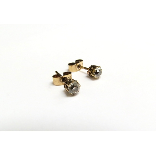 8006 - A pair of diamond stud earrings, 0.20ct each approx