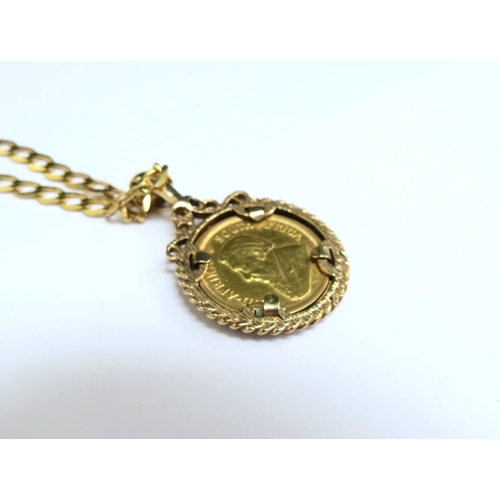 8028 - A 9ct gold flatlink neckchain, 50cm long, hung with a 1/10oz Krugerrand in gold pendant mount, 11.3g