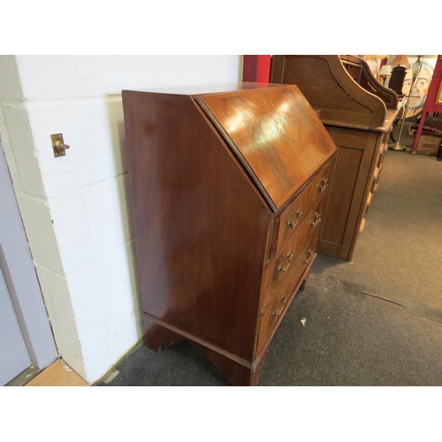 1083 - A Georgian style flame mahogany crossbanded bureau, diamond form marquetry to fall front, over three... 