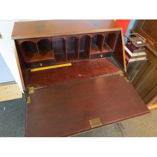 1083 - A Georgian style flame mahogany crossbanded bureau, diamond form marquetry to fall front, over three... 