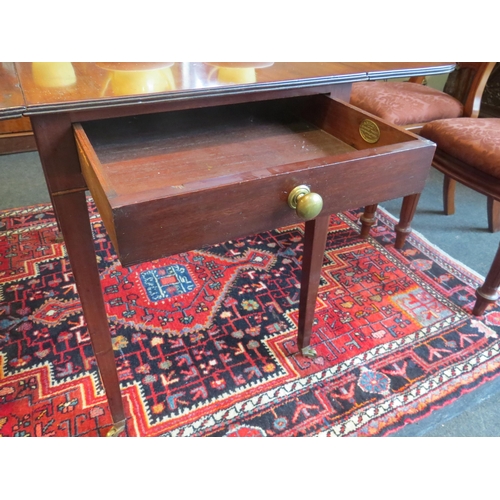 1091 - A Victorian mahogany Pembroke table, single end drawer, on square tapering legs to brass castors