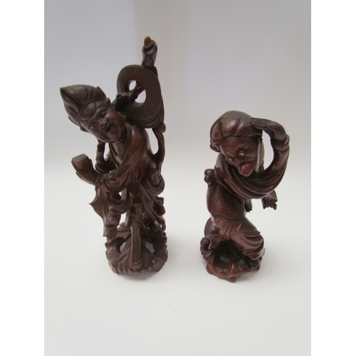 1353 - Two Oriental carved figures, tallest 30cm