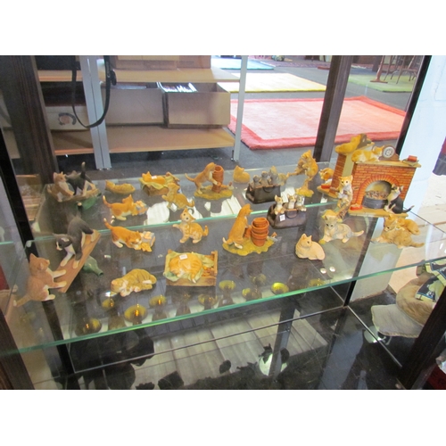 1356 - A collection of resin cat figurines including Sherrat & Simpson