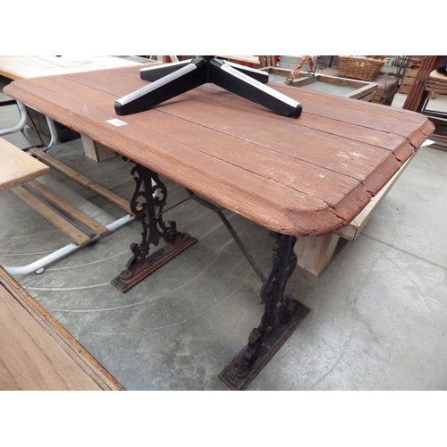 3455 - A cast iron based, wooden top pub table