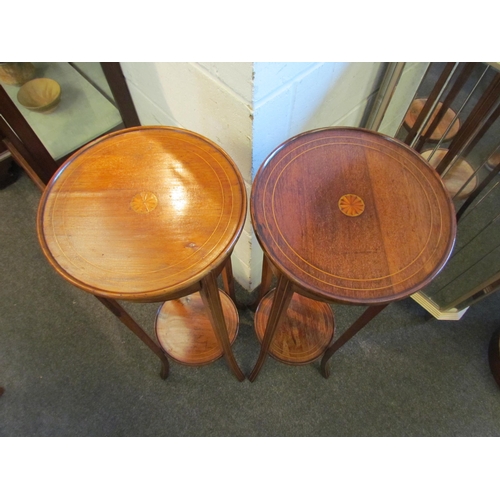 1004 - A pair of Edwardian mahogany jardiniere stands, satinwood strung with shell marquetry centre, with u... 