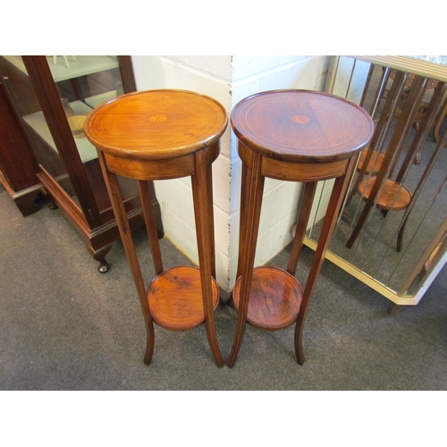 1004 - A pair of Edwardian mahogany jardiniere stands, satinwood strung with shell marquetry centre, with u... 