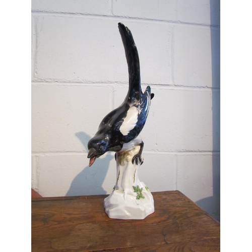 1006 - A Meissen figure of a magpie, restored, 38cm tall             (R) £30