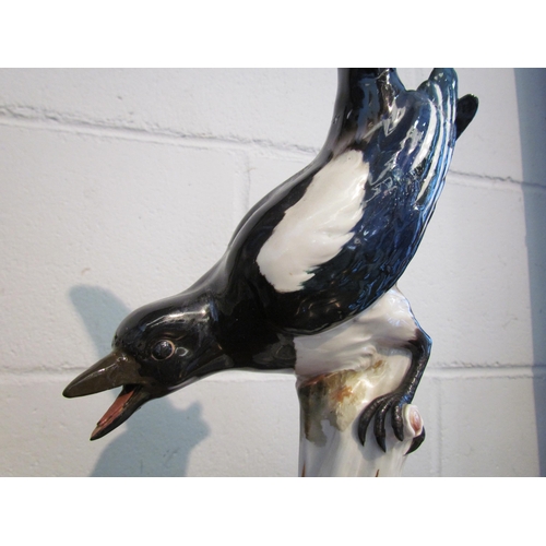 1006 - A Meissen figure of a magpie, restored, 38cm tall             (R) £30