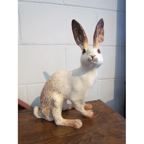 1007 - A Winstanley figure of a white hare, 39cm tall