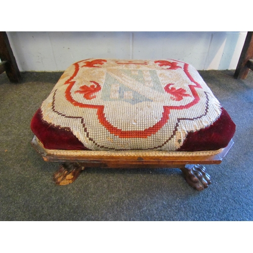 1010 - A Regency rosewood footstool on paw feet, shield tapestry, a/f               (E) £30-60