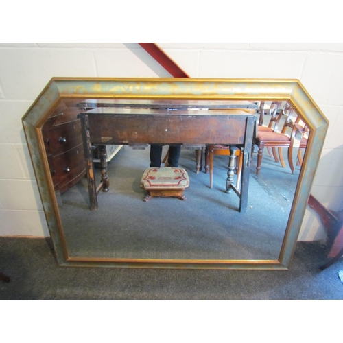 1011 - A large overmantel mirror with bevel edge, 106cm x 135cm   (R) £20