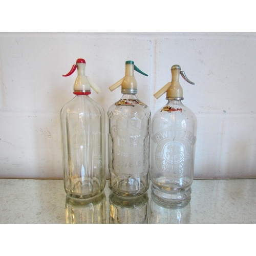 1019 - Three vintage glass soda syphons including R. Whites