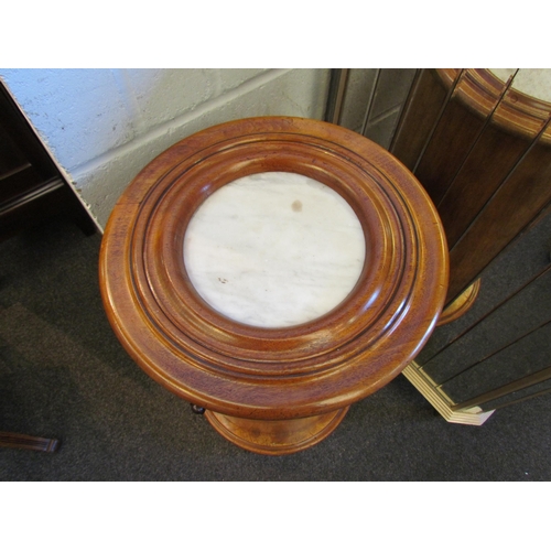 1023 - A Victorian walnut pedestal table with marble top and single door, plinth base, 71cm tall