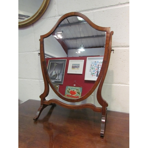 1034 - A shield shaped table top mirror, 62cm tall x 43cm wide