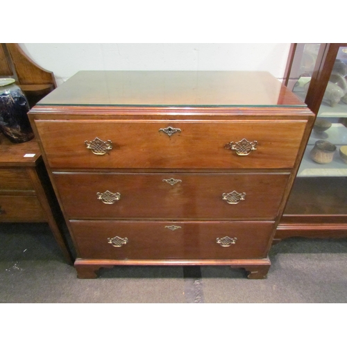 1036 - A George III mahogany caddy top chest of three graduated long drawers, 96cm tall x 100cm wide x 51cm... 