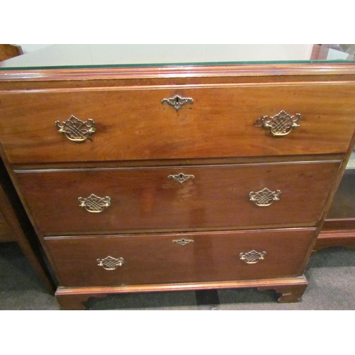 1036 - A George III mahogany caddy top chest of three graduated long drawers, 96cm tall x 100cm wide x 51cm... 