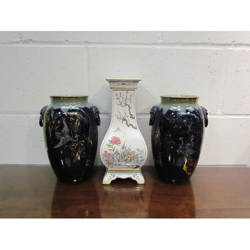 1040 - A pair of blue glazed vases with gilt crane and willow pattern together with a Franklin Mint decorat... 