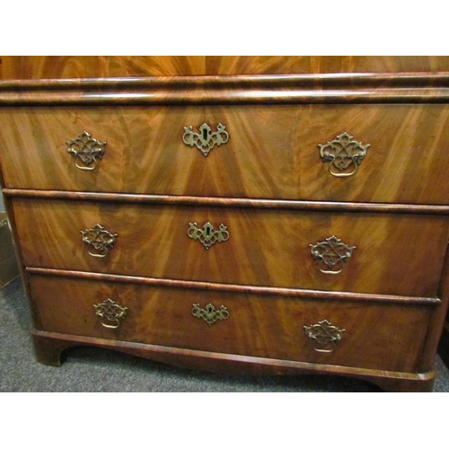 1052 - A 19th Century flame mahogany escritoire, the slim drawer over a fall-front opening to reveal a fitt... 