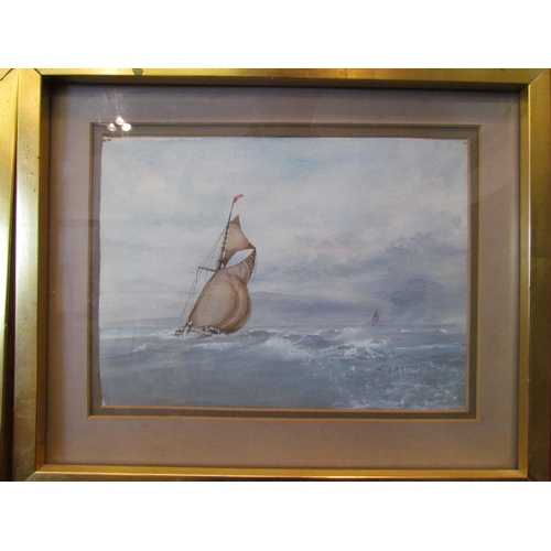 1057 - A pair of watercolours depicting ships at sea, gilt framed and glazed, 18cm x 25cm image sizes