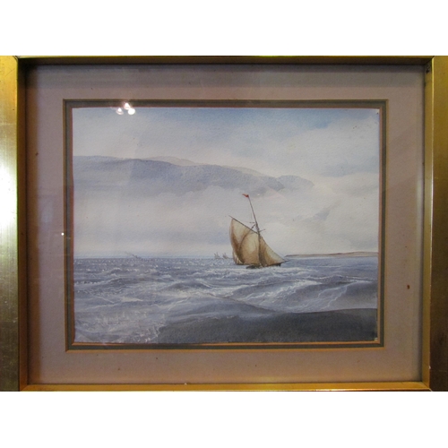 1057 - A pair of watercolours depicting ships at sea, gilt framed and glazed, 18cm x 25cm image sizes