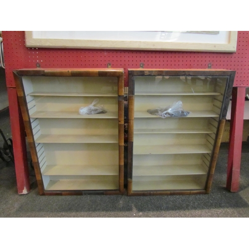 1069 - Two wall hanging display cabinets with adjustable shelves, some losses, 66cm tall x 46cm wide x 11cm... 