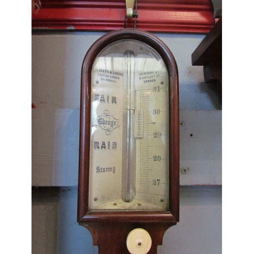 1076 - A Negretti & Zambra mahogany stick barometer