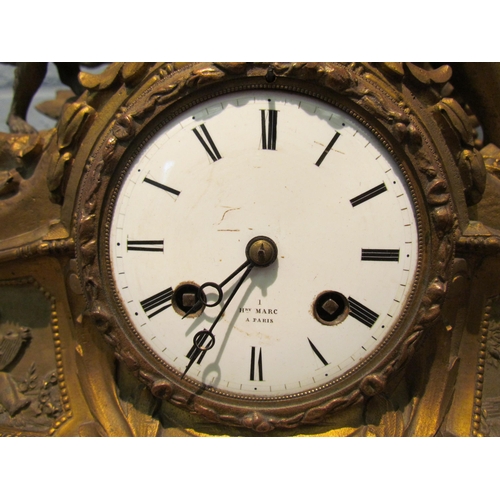 1077 - A gilt metal mantel clock. Henry Marc Paris dial. Decorated with huntsman, hound and pheasant. 35cm ... 