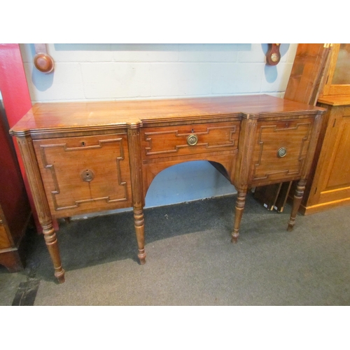 1079 - A Regency sideboard, single drawer flanked by drop-flap cupboard doors, turned legs, handle loose, 9... 