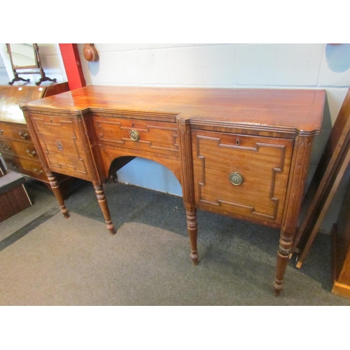 1079 - A Regency sideboard, single drawer flanked by drop-flap cupboard doors, turned legs, handle loose, 9... 