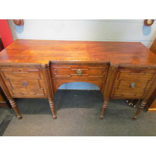 1079 - A Regency sideboard, single drawer flanked by drop-flap cupboard doors, turned legs, handle loose, 9... 