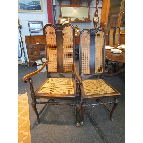 1087 - A set of eight bergere dining chairs (6 + 2 carvers) on pad fore feet, turned stretchers     (E) £80... 