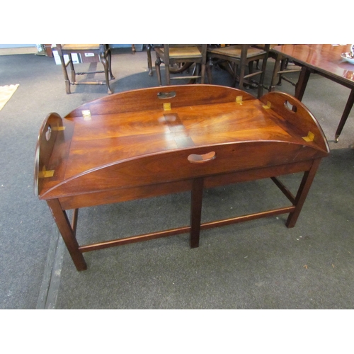 1089 - A reproduction mahogany butler's tray-top coffee table, 45cm tall x 130cm long x 84cm wide