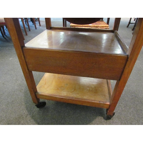 1094 - An early 20th Century oak drop leaf tea trolley   (D)