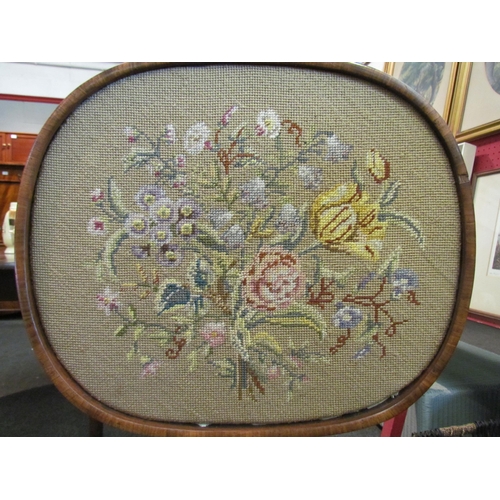 1095 - A William IV mahogany pole screen, the brass pole with needlepoint floral design, on a melon fluted ... 