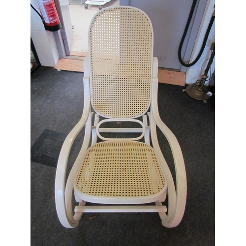 1132 - A Thonet style white painted rocking chair            (R) £25