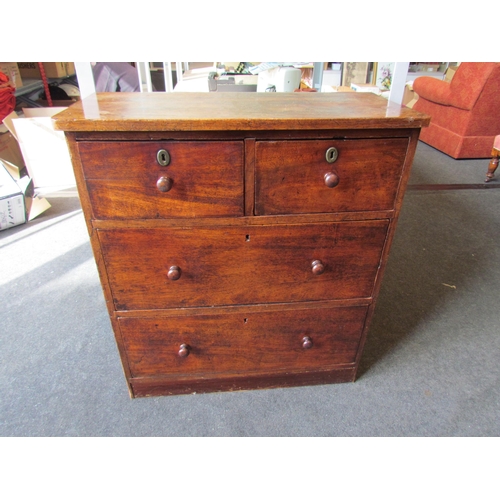 1191 - A 19th Century mahogany chest of two short over two long drawers, turned handles, 87cm tall x 77cm w... 