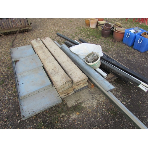 3441 - A pallet of pipe and guttering, scaffold boards and sheeting