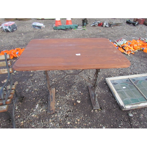 3455 - A cast iron based, wooden top pub table