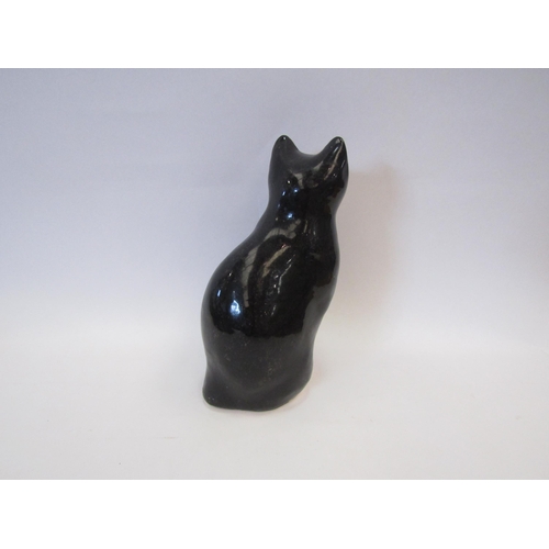 1303 - A Winstanley figure of a black and white seated cat, 22cm tall