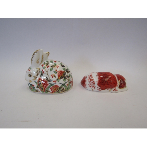 1307 - Two Royal Crown Derby paperweights, Meadow Rabbit, silver stopper and Puppy, gold stopper