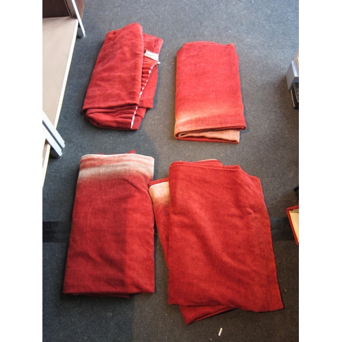 1195 - Two pairs of deep red curtains (some fading) together with a matching pelmet etc.