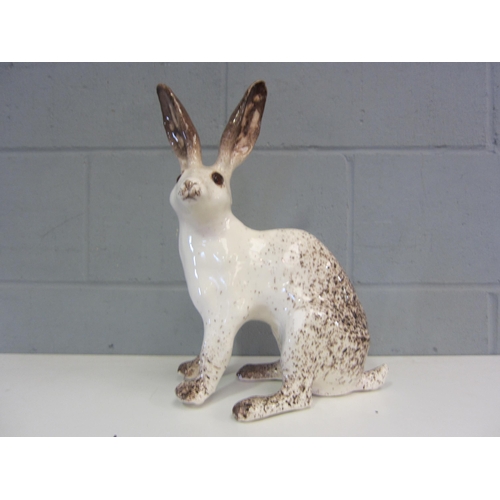 1250 - A Winstanley figure of a white hare, 39cm tall, some glaze missing to leg, restoration to ear etc