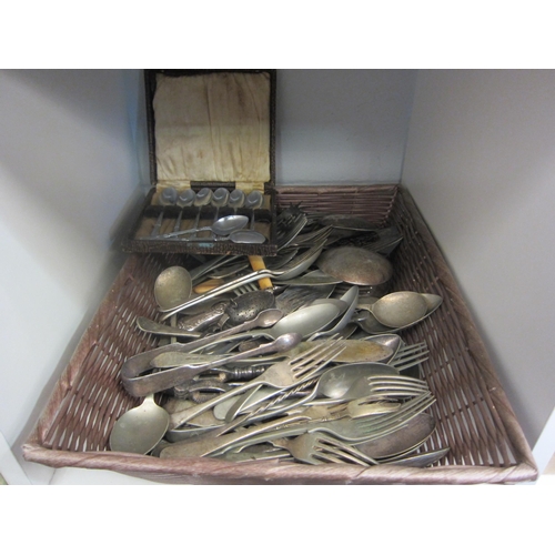 1390 - A basket of plated cutlery