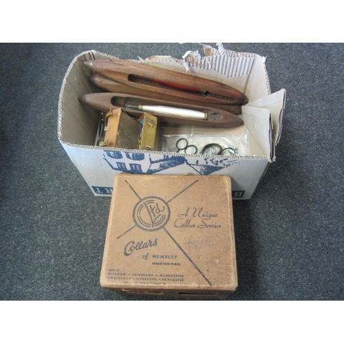 1395 - A box containing vintage sewing items including three shuttle bobbins, needle case in the form of a ... 