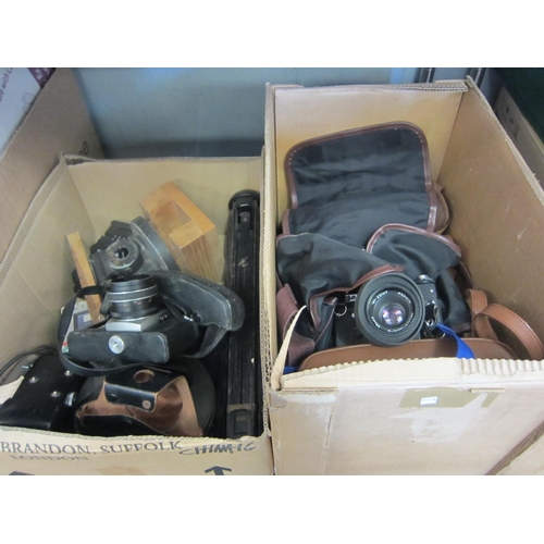 1407 - Two boxes containing vintage cameras and equipment including Petri &, Prinzflex and Zenit